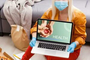 Healthcare online consulting concept, health by laptop photo