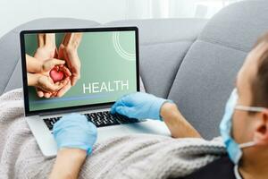 Healthcare online consulting concept, health by laptop photo