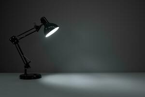 Black decorative lamps with empty desk background, 3d rendering. photo