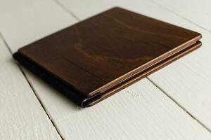 wooden book on a white background photo