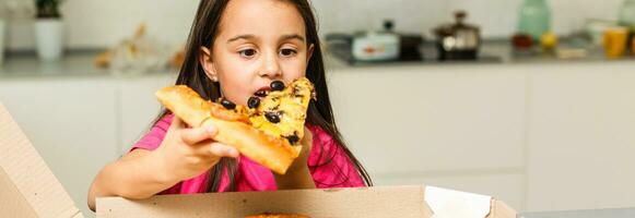 Pretty girls smiling eating pizza photo