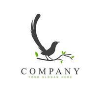 magpie silhouette logo design perching on a tree branch vector illustration