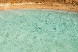 The cyan saline lake, natural lake background. photo