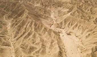Dryness land with erosion terrain, geomorphology background. photo