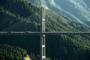 The bridge between the mountains. Guozigou Bridge in Xinjiang, China. photo