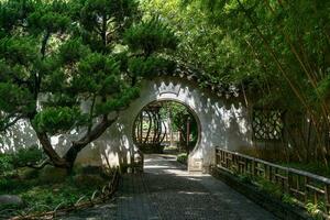 Ancient traditional garden, Suzhou garden, in China. Translation like a curve photo