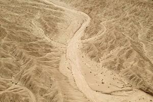 Dryness land with erosion terrain, geomorphology background. photo