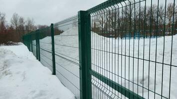 Horizontal metal lattice fence is an abstract background photo