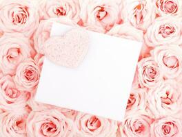 Beautiful roses with gift card photo