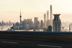 Asphalt road and urban building of Shanghai, driveway and road. photo