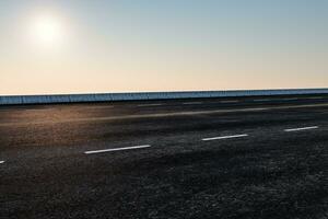 The empty Asphalt road and daylight sky and sunshine. photo