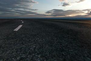 The empty Asphalt road and daylight sky and sunshine. photo