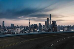 Asphalt road and urban building of Shanghai, driveway and road. photo