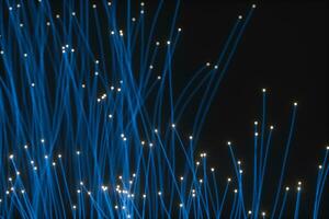 Flowing and glowing particles with dark background, 3d rendering photo