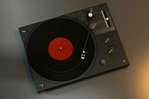 The dark vinyl record player on the table, 3d rendering. photo