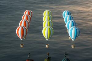 Hot air balloon flying over the ocean, 3d rendering. photo