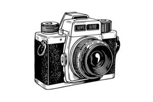 Modern photo camera in engraving style. Vector retro hand drawn illustration.