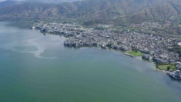 Village and lake in Shuanglang, Yunnan, China. video