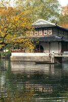 the autumn in the park of Suzhou Garden in China photo