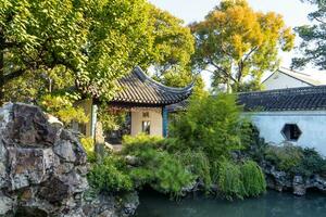 the autumn in the park of Suzhou Garden in China photo