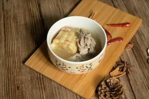 Corn and pork bone soup, delicious Chinese food. photo