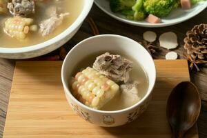 Corn and pork bone soup, delicious Chinese food. photo