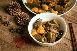 Chestnut fried with finless eel, homemade food photo