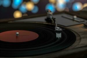 The old wooden vinyl record player on the table, 3d rendering. photo