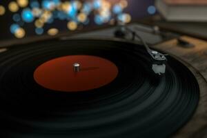 The old wooden vinyl record player on the table, 3d rendering. photo