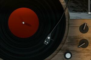 The old wooden vinyl record player on the table, 3d rendering. photo