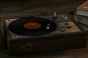 The old wooden vinyl record player on the table, 3d rendering. photo