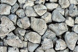 gris Roca textura para antecedentes. modelo con rocas o grava foto