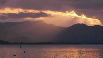 Beautiful rays of the sun break through the clouds. video