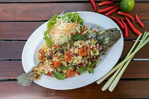 Fried Snakehead Fish in Spicy Herb Salad photo