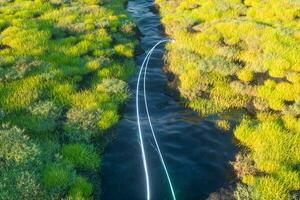 The river between the mountains in a sunny day, 3d rendering photo