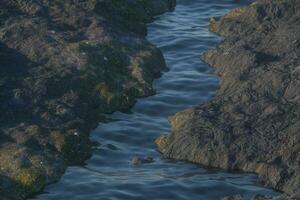 The river between the mountains in a sunny day, 3d rendering photo