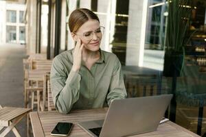 The programmer is leading a new project and is happy with the business. Training online education on the website. A female student designer uses a tablet for online work. photo