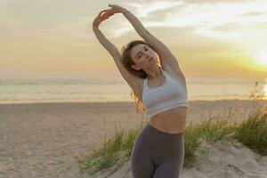 Meditation and harmony. Does the asana pose workout outdoors. A female trainer uses fitness clothes for exercise. A healthy lifestyle is mental health, the life of a modern person. photo