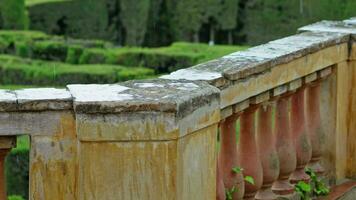 A rainy day in the park, raindrops on the railing. video