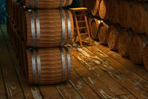 Wooden cellar with barrels inside, vintage beverage warehouse, 3d rendering. photo