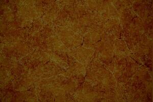 Mottled red and ochre stone style background photo