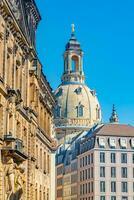 Dresden, Saxony, Germany. Famous historical downtown Augustus street with long, dramatic mural wall made of porcelain tiles depicts Saxon rulers photo
