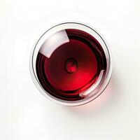 Glass of red wine top view isolated on a white background photo