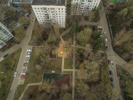 Aerial shot of apartment blocks with yard in Moscow photo