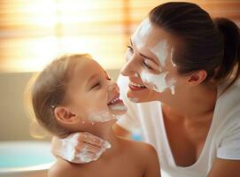 A woman and daughter doing face cream photo