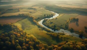 Aerial view of a tranquil autumn meadow, reflecting sunlight generated by AI photo