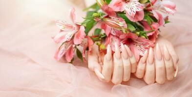 Elegant pastel pink natural manicure. photo