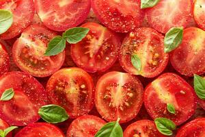 Tomatoes with spices and basil. photo