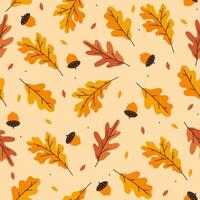 Seamless pattern with autumn oak leaves and acorns on a yellow background. Vector graphics.