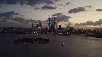 CBD buildings by Jinji Lake at night in Suzhou, China. video